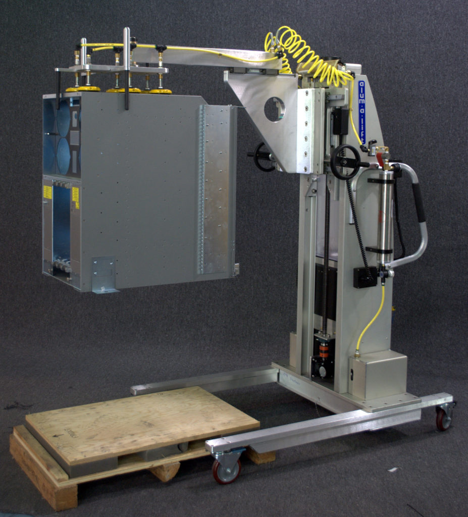 Vacuum Lift with Guide Probes Raising Electronic Assembly from Pallet