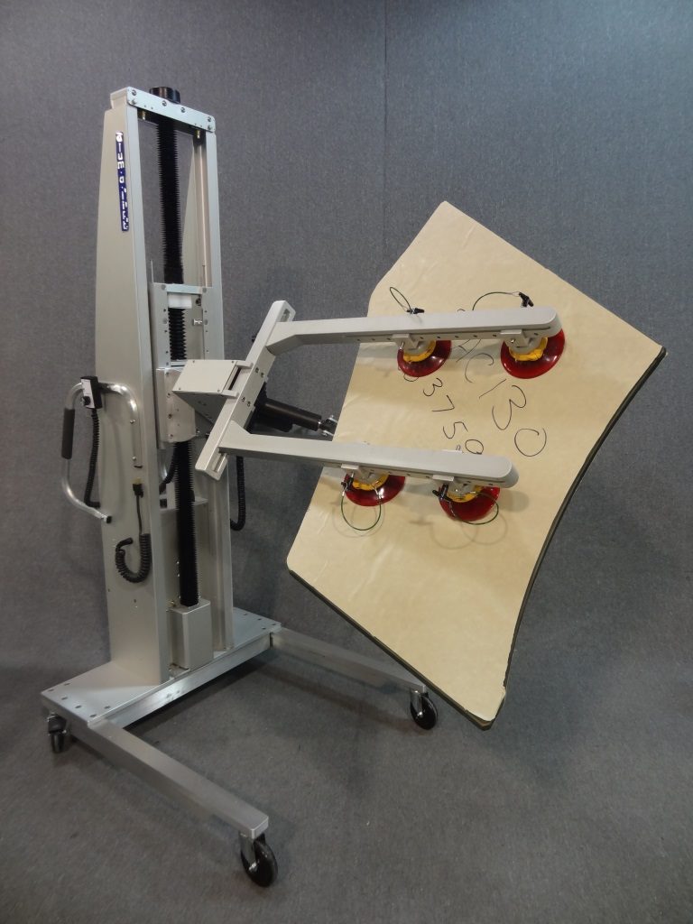 Lift with Suction Cup Array for Rotating Glass Sheets